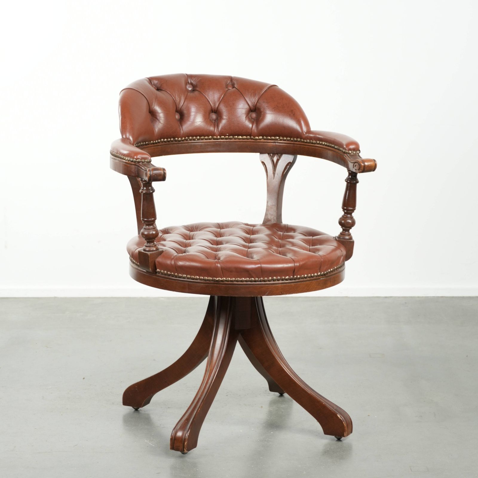 Swivel English Style Cowhide Chesterfield Office Chair In A Beautiful Brown Color