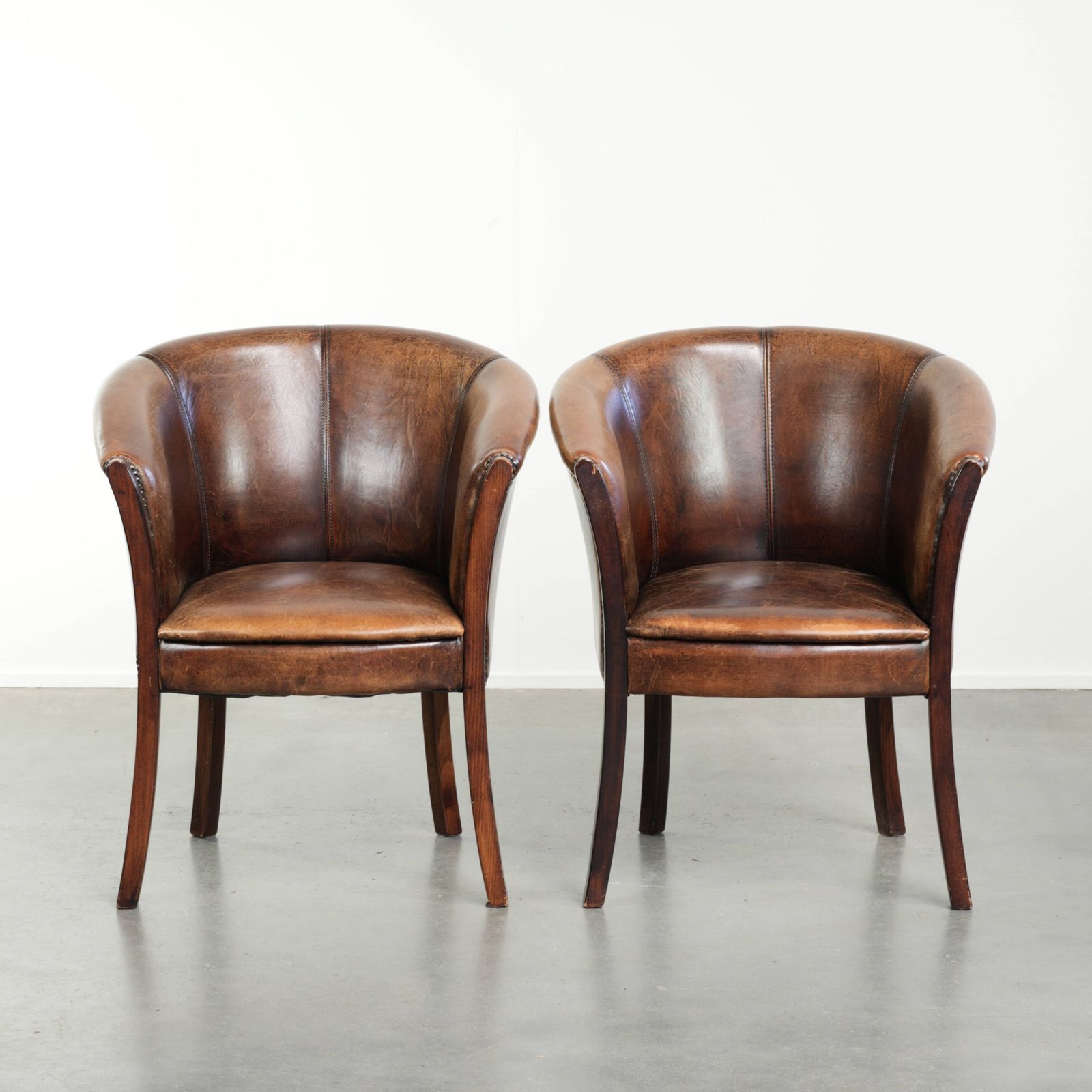 Set Of Two Handy Sheepskin Occasional Chairs/Armchairs/Tubchairs With Character And A Beautiful Patina