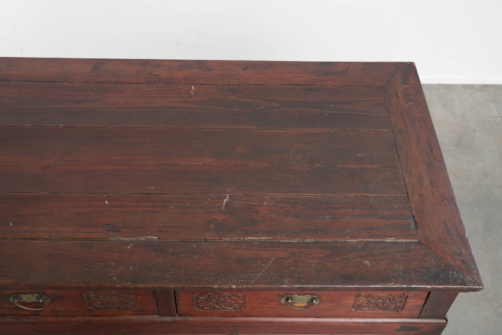 Antique Wooden Chinese Sideboard From The Late 19th Century In A Beautiful Red Color With Exquisite Wood Carving. photo vintage
