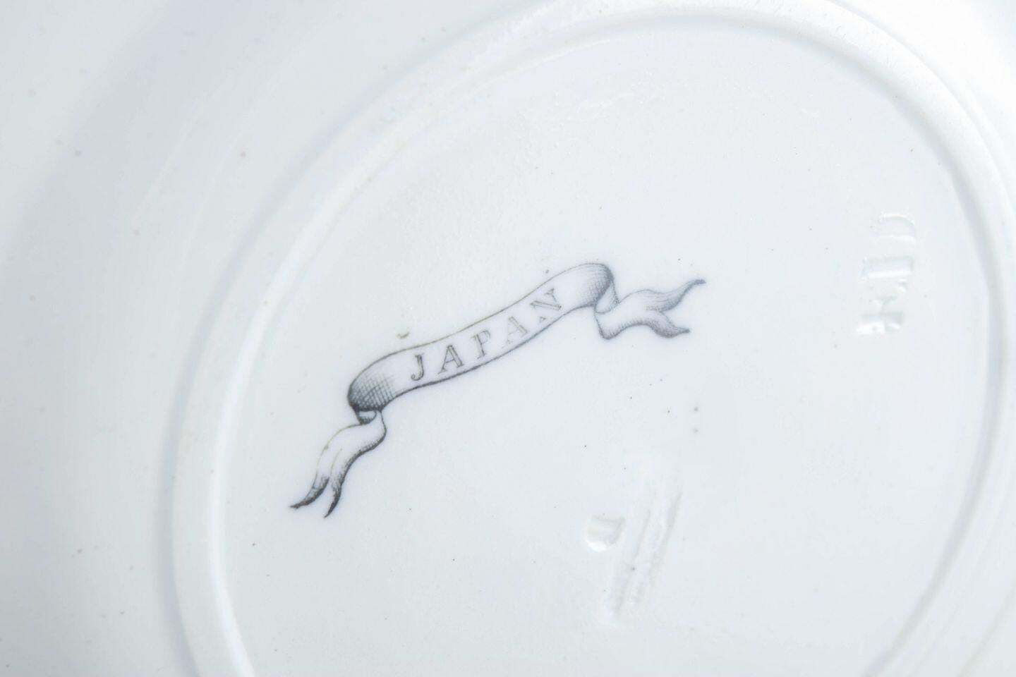 Rörstrand. Set van negen lunchborden in faience. 'Japan' serie. Begin 20e eeuw. photo Woonaccessoires
