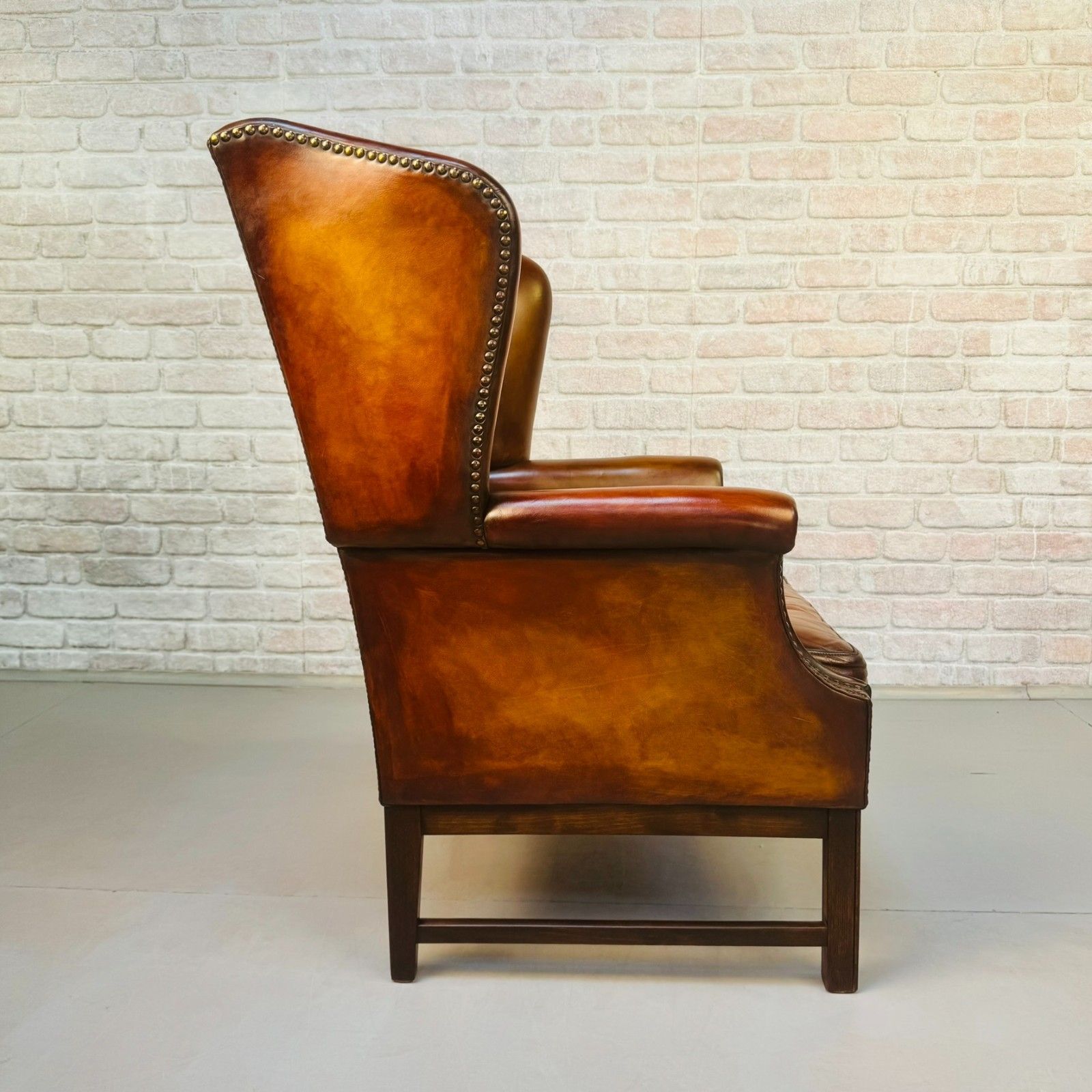 Neat Vintage Danish Leather Wingback Chair – Hand Dyed Tan Colour photo vinterior