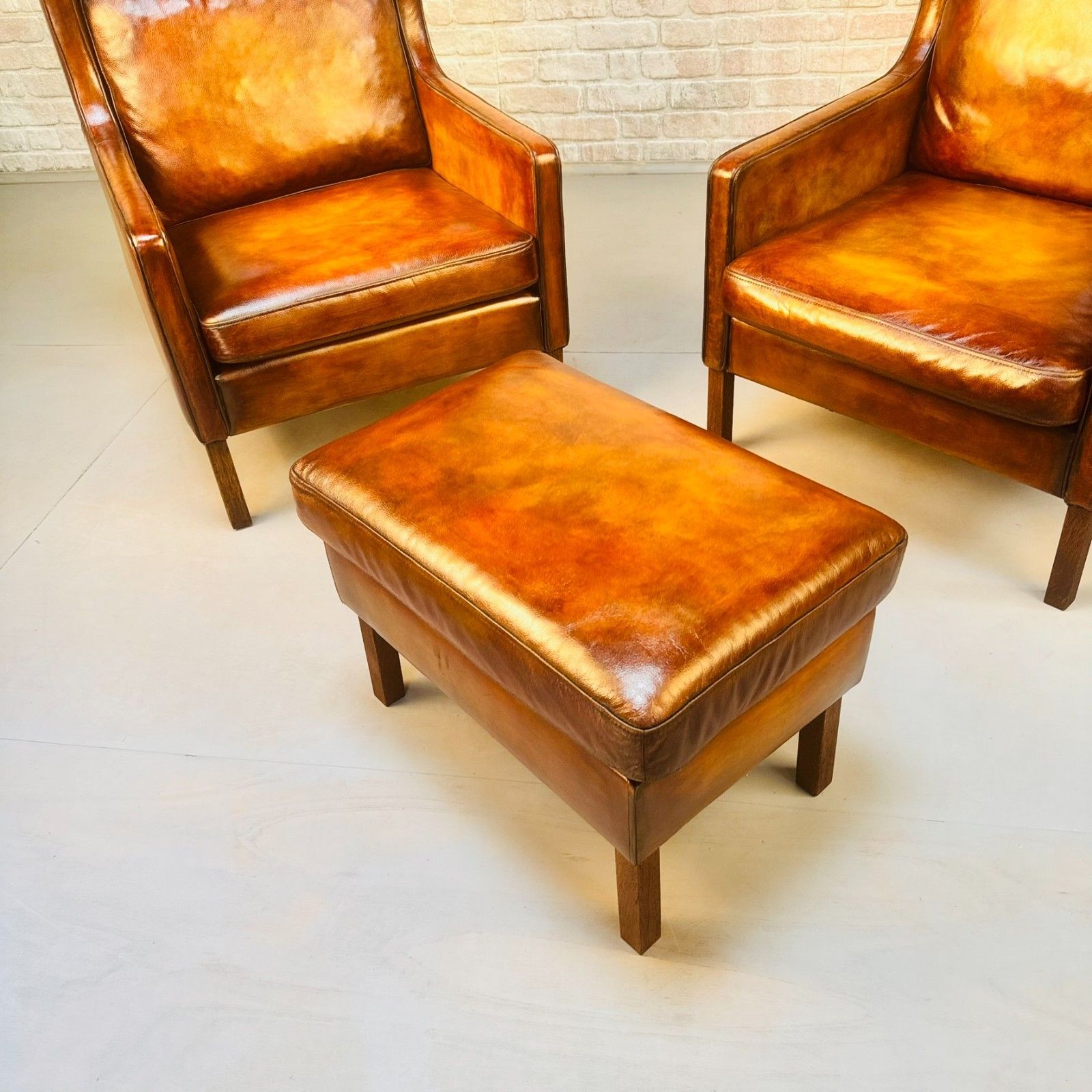 2420.0 Pair Vintage Danish Wingback Chairs & Footstool Tan Leather Lounge Set photo