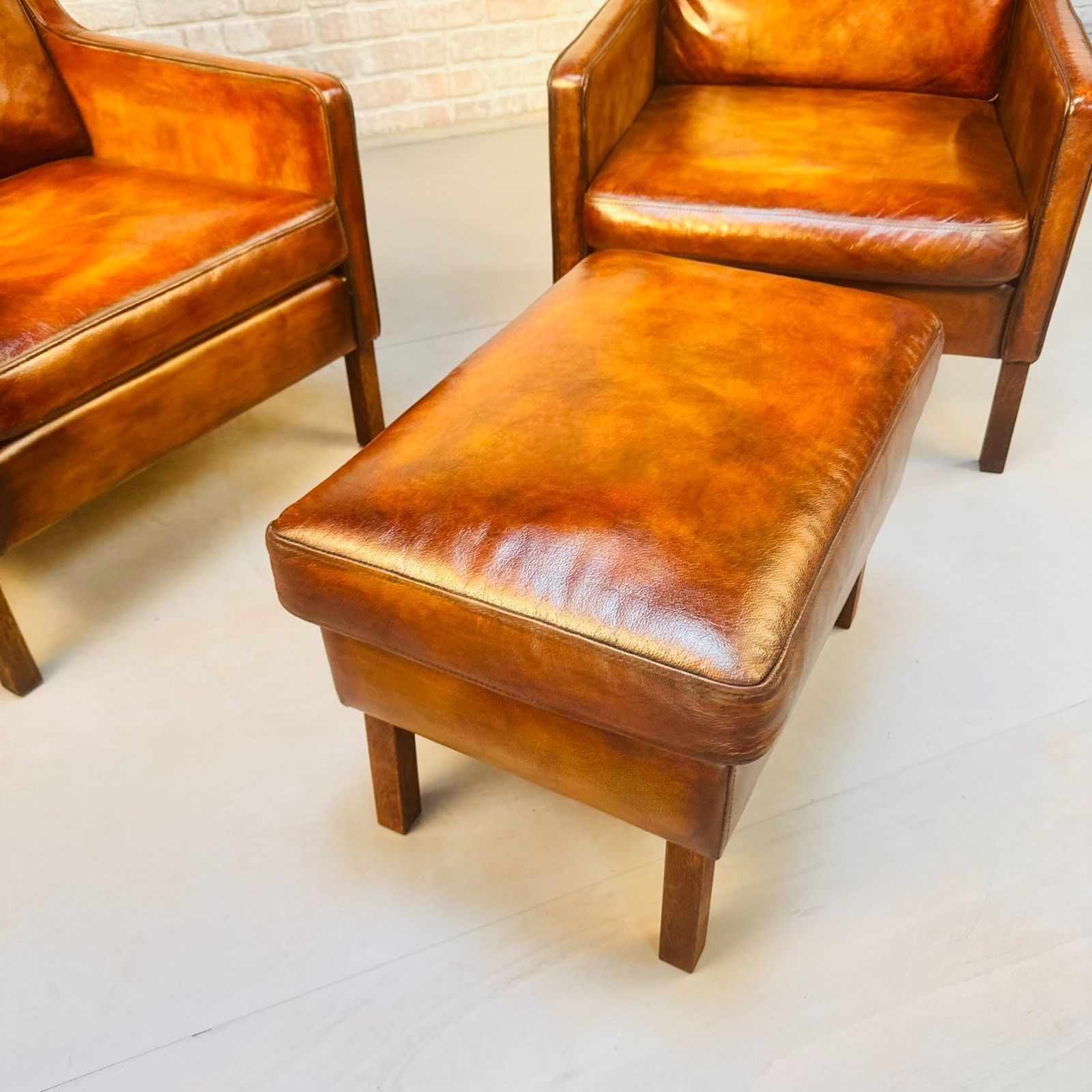 photo buy Pair Vintage Danish Wingback Chairs & Footstool Tan Leather Lounge Set