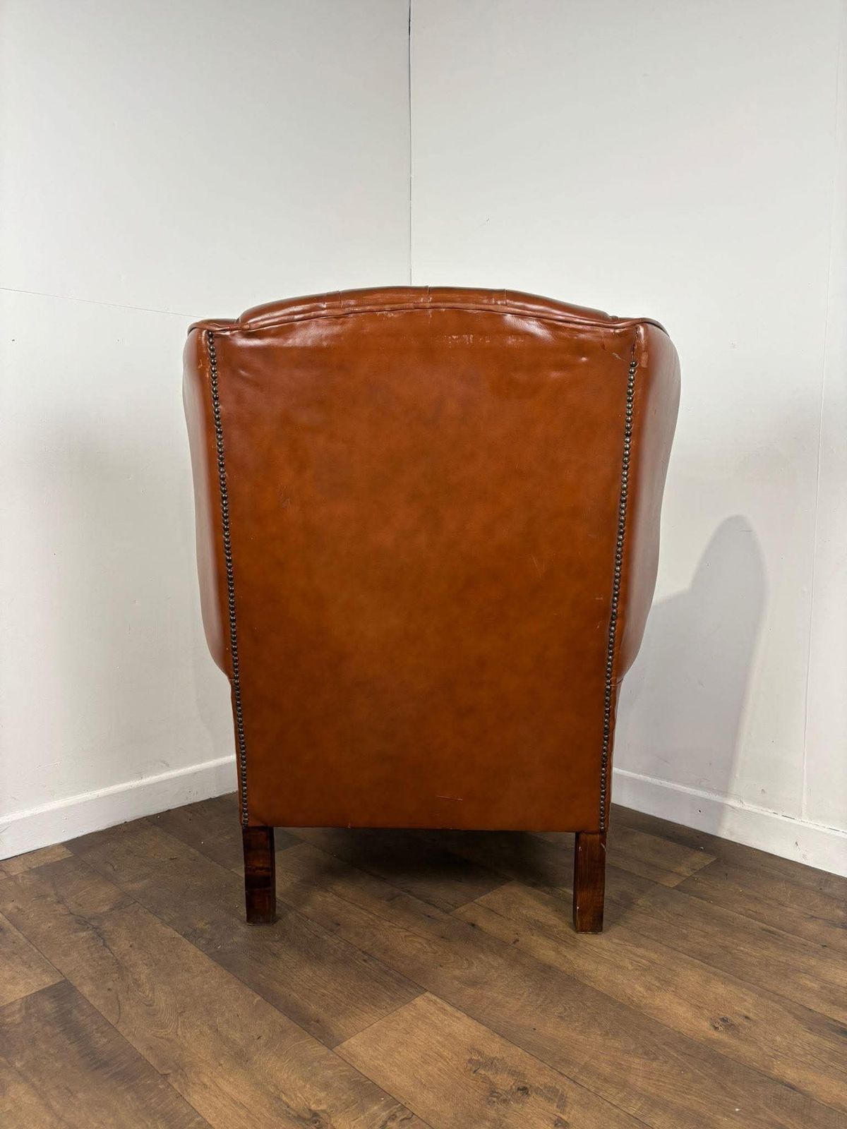 669.0 Tan Leather Chesterfield Style Wingback Armchair photo