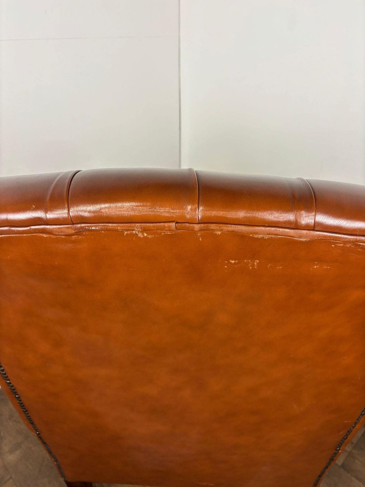 photo buy Tan Leather Chesterfield Style Wingback Armchair