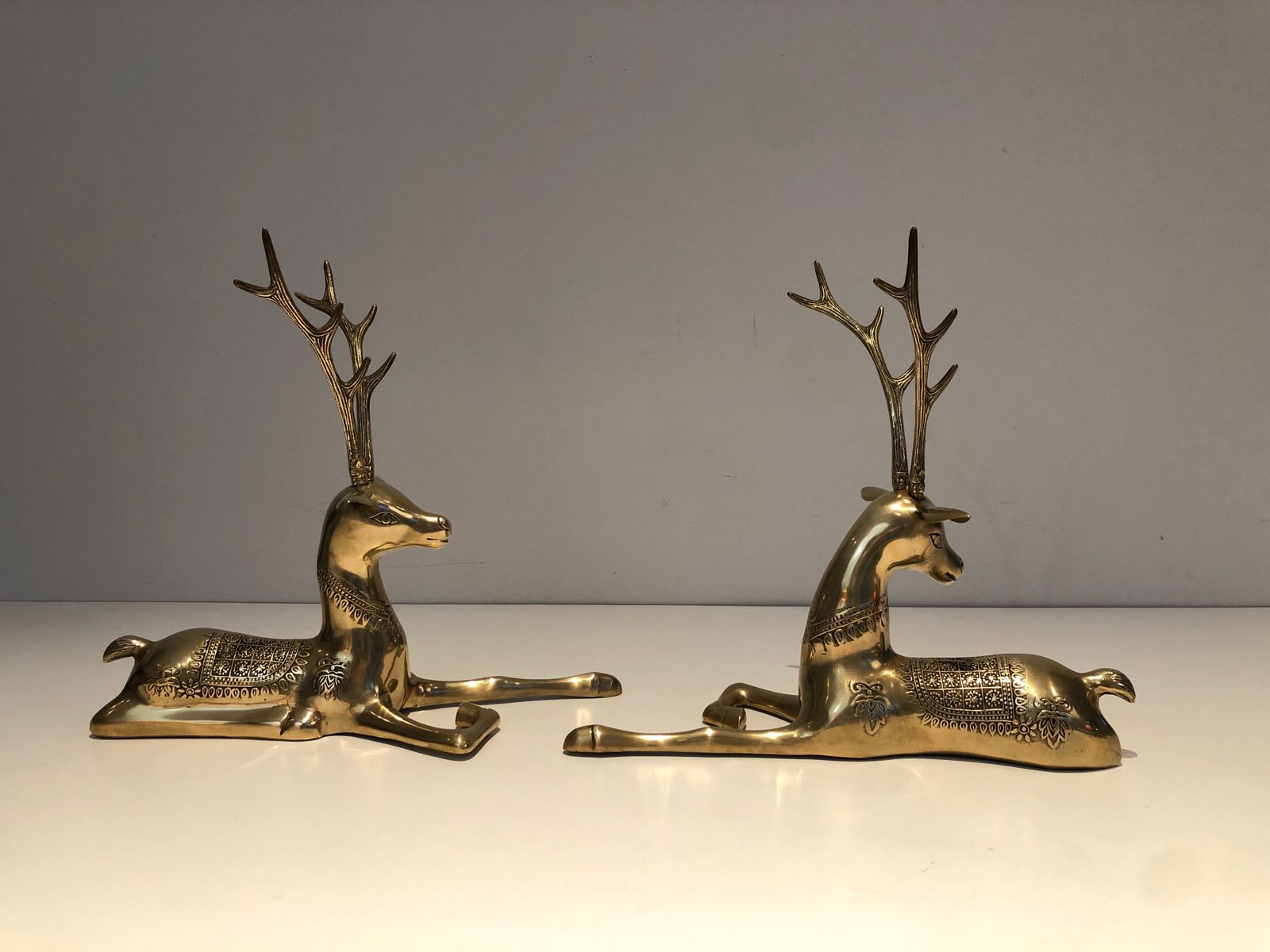 Pair Of Bronze Reclining Deer Engraved With Shamanic Motifs. French Work. Circa 1970 photo furniture