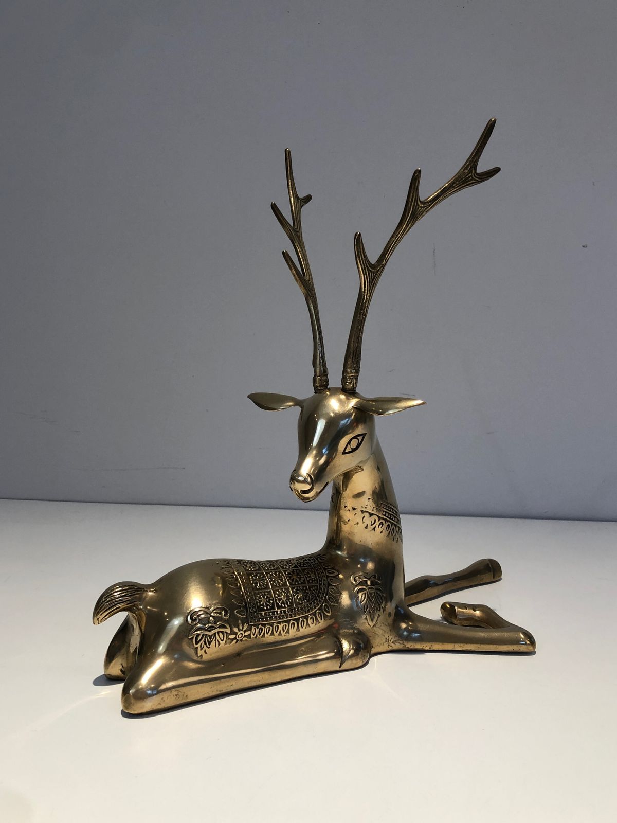 photo buy Pair Of Bronze Reclining Deer Engraved With Shamanic Motifs. French Work. Circa 1970