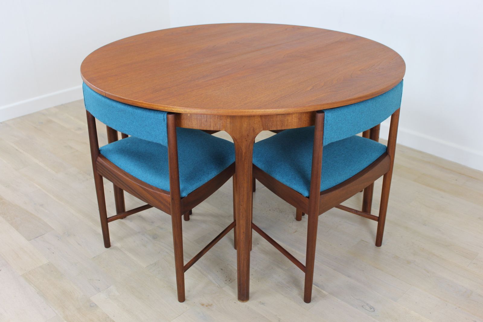 photo furniture Late 1960s McIntosh Teak "Roundette” Circular Table & Chairs Dining Set