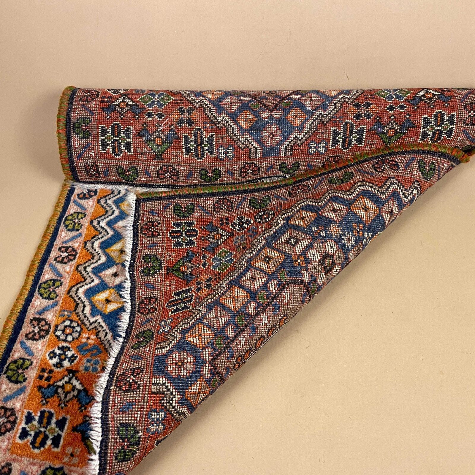 125.0 Small Accent Rug Wool Middle Eastern Style Decorative Tasselled Orange Blue Detailed Pattern photo