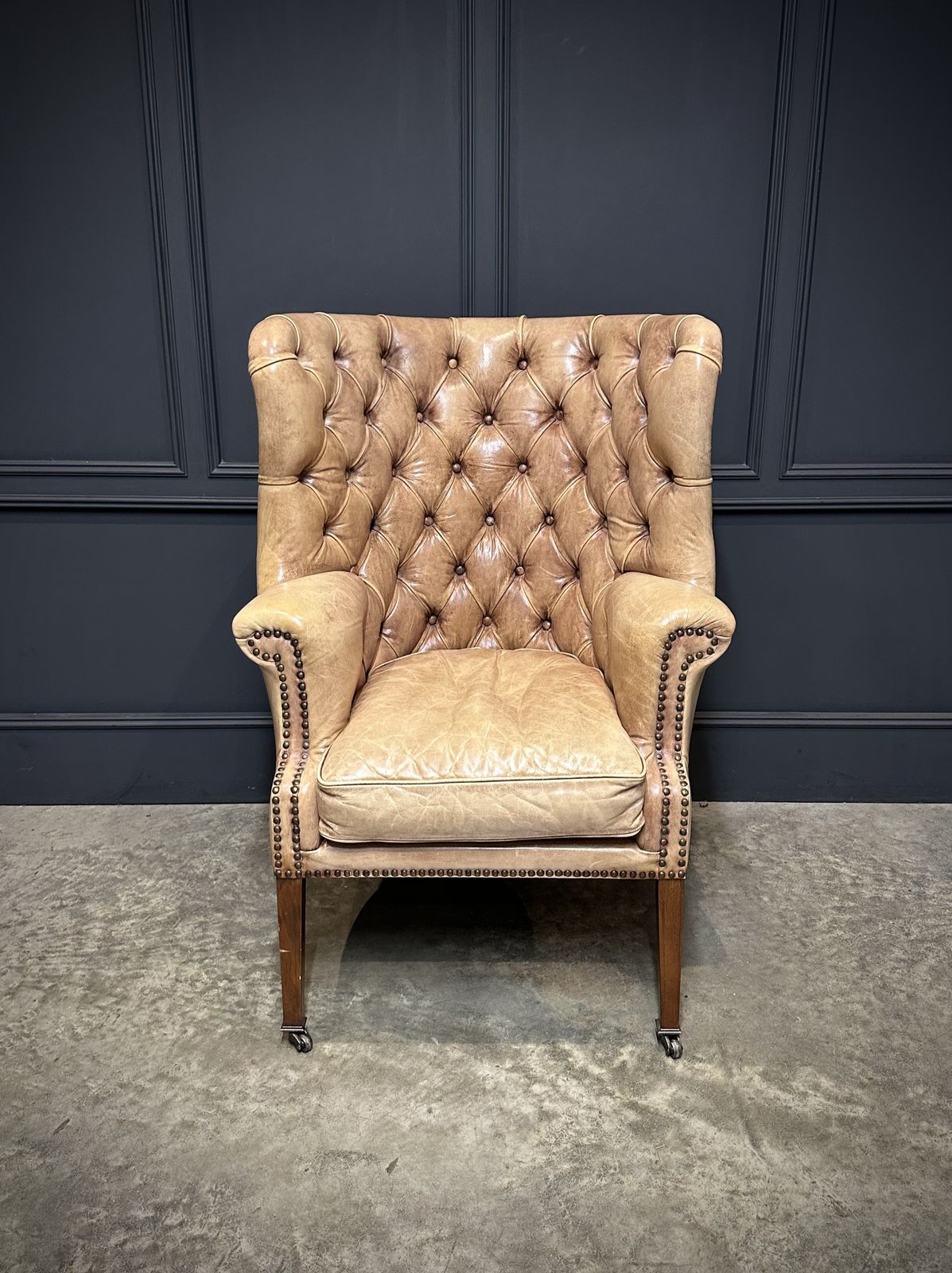 Buttoned Leather Porters Wing Chair photo furniture