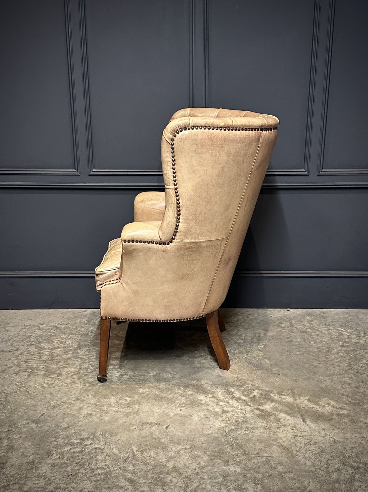 Buttoned Leather Porters Wing Chair photo vinterior