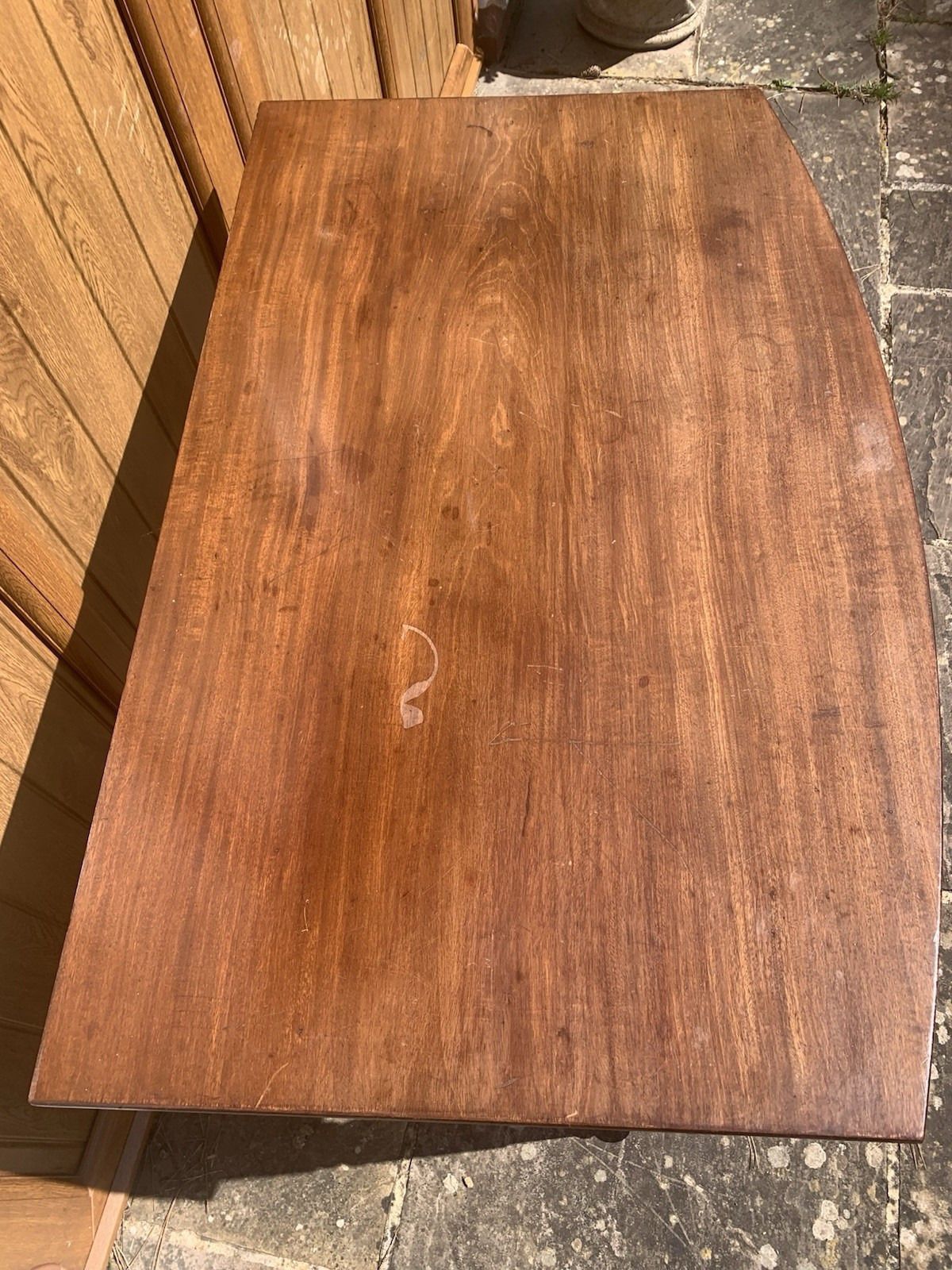 A Regency Bowfront Side Table With Bobbin Legs. photo Furniture
