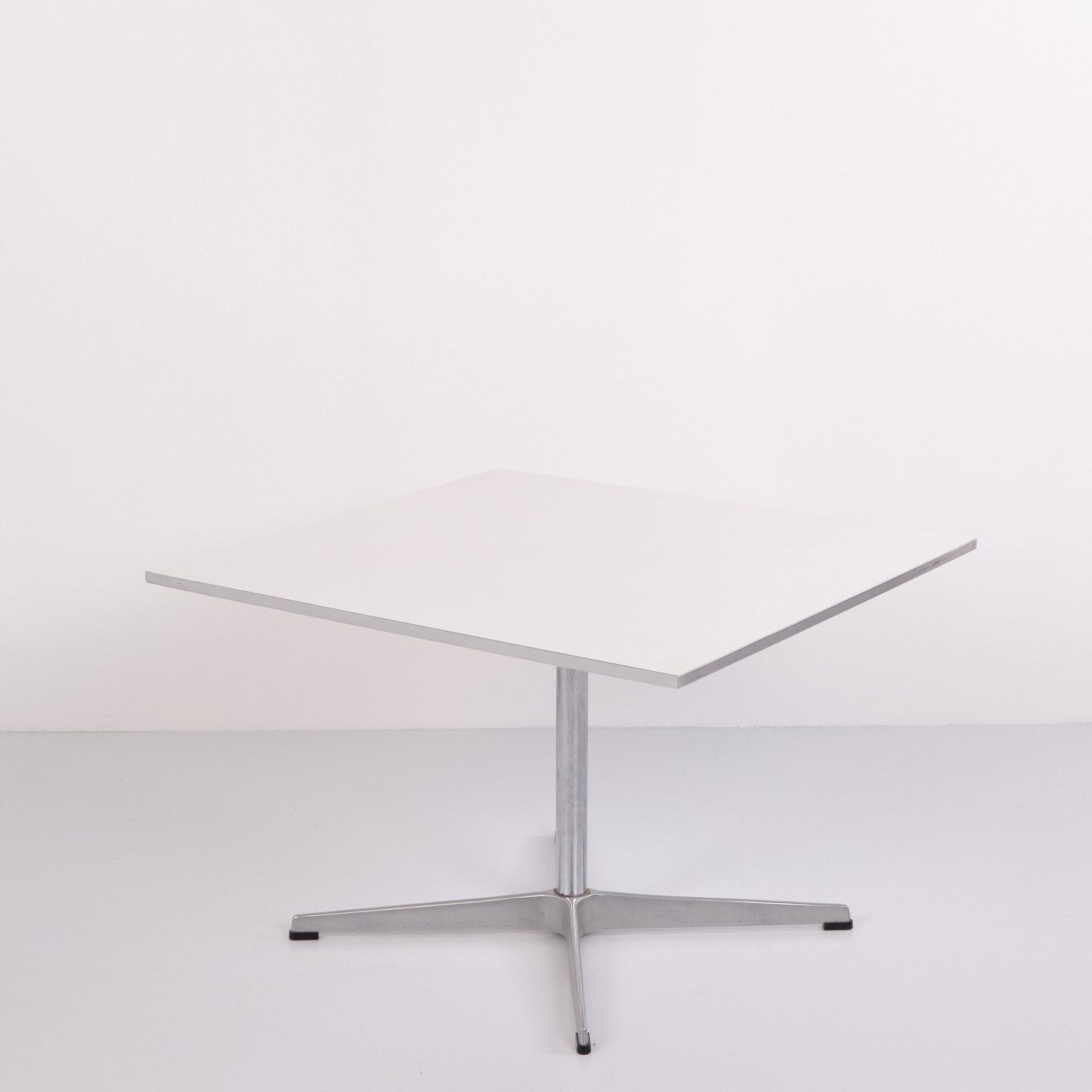 Coffee Table By Arne Jacobsen And Piet Hein With White Laminate Top And Steel Edge For Fritz Hansen photo furniture