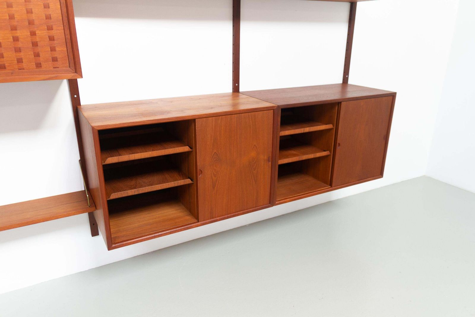 photo furniture Danish Modern 3 Bay Modular Teak Wall Unit By Poul Cadovius For Cado, 1960s.