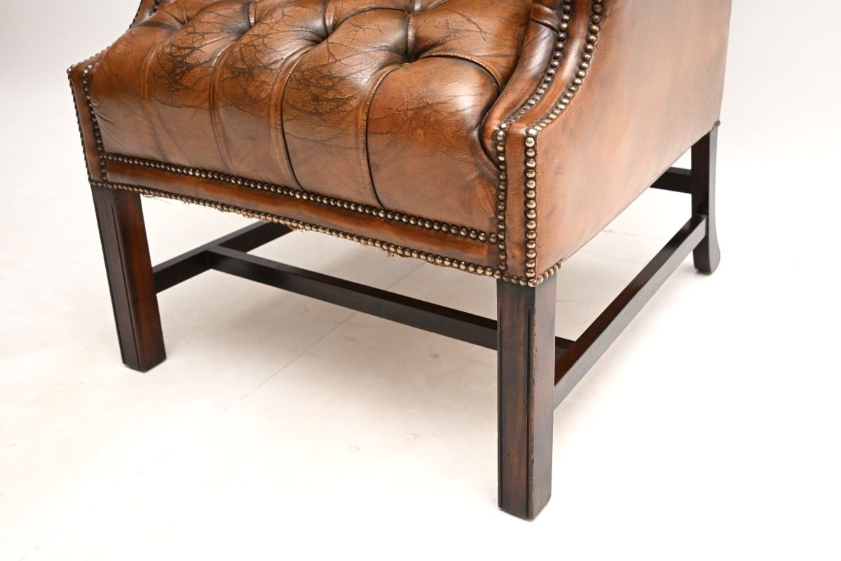 Antique Deep Buttoned Leather Wing Back Armchair photo vintage