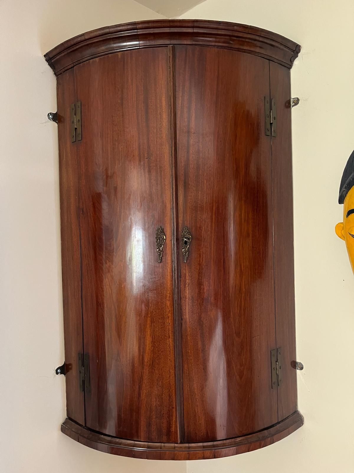 Victorian Mahogany Bow Fronted Corner Cupboard With Brass Hinges And Key Escutcheons