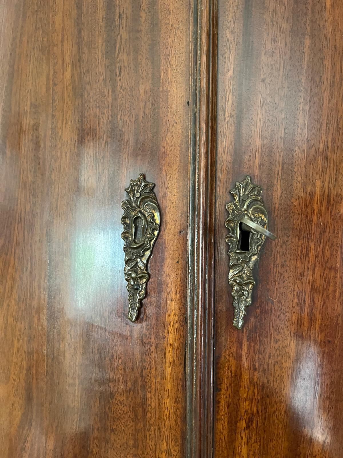 Victorian Mahogany Bow Fronted Corner Cupboard With Brass Hinges And Key Escutcheons photo for sale