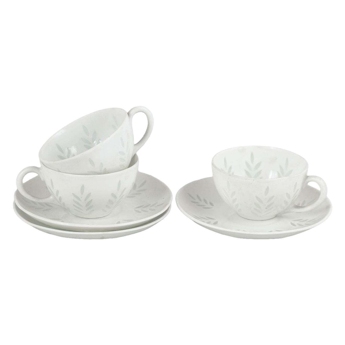 Friedl Holzer Kjellberg pour Arabia. Trois tasses à café demi-tasse en porcelaine avec soucoupes