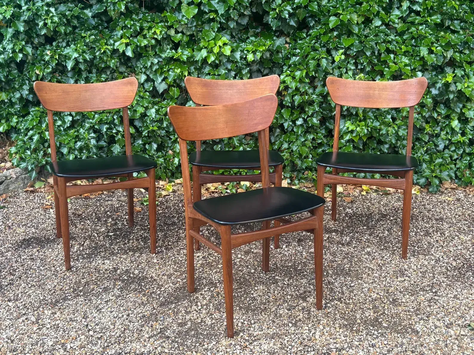 Set Of Four Mid Century Teak Vinyl Dining Chairs photo furniture