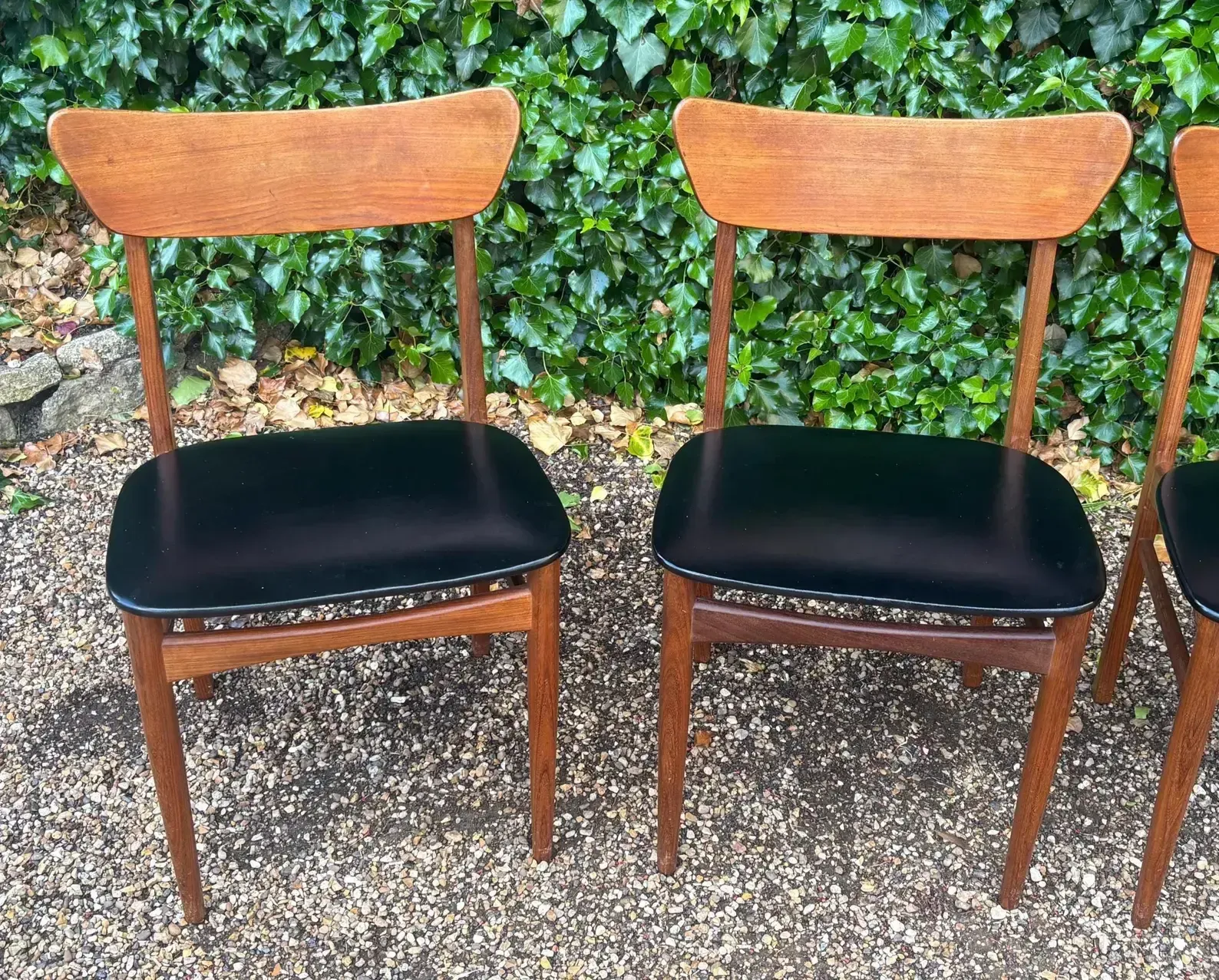 Set Of Four Mid Century Teak Vinyl Dining Chairs photo vinterior