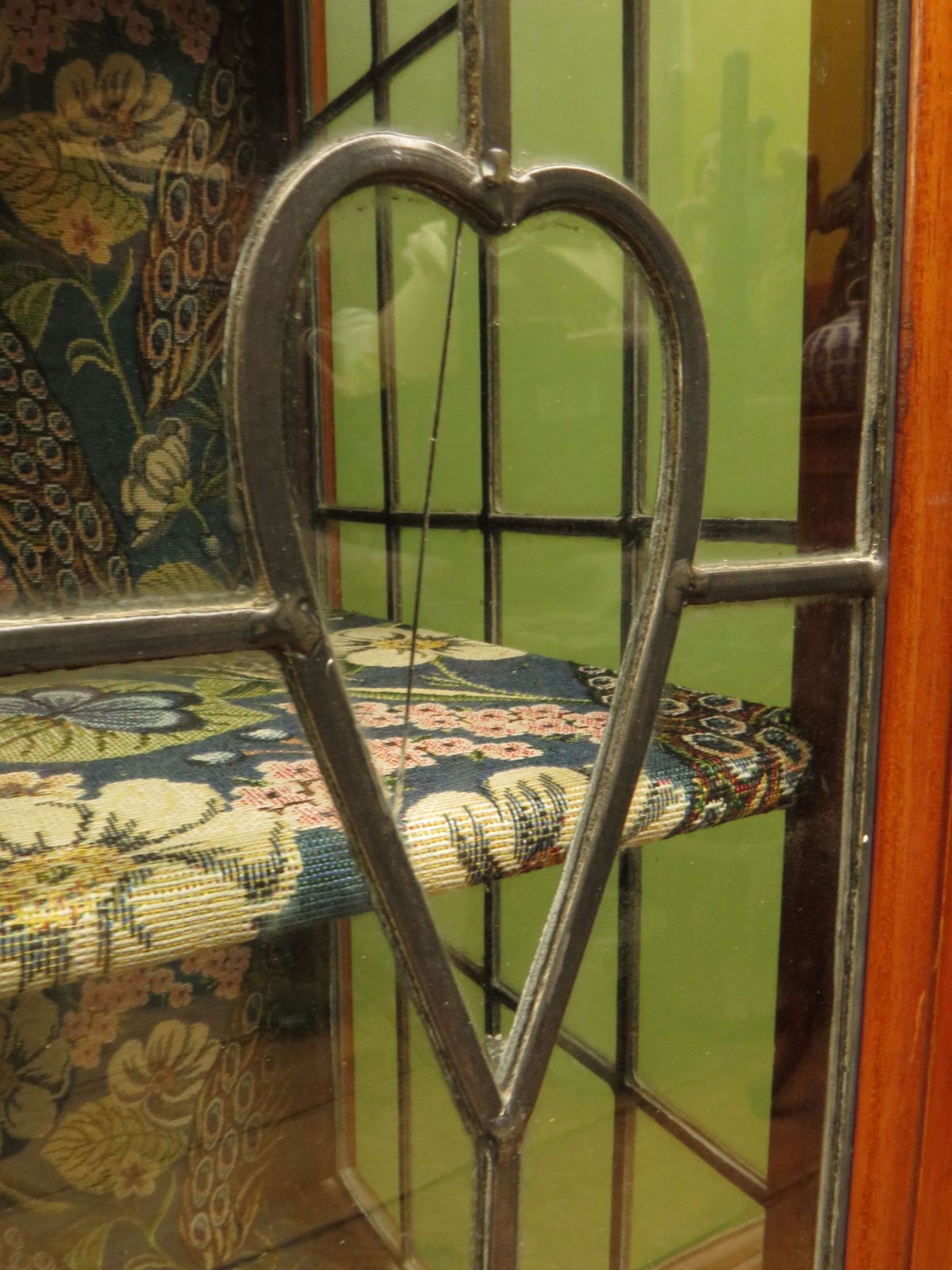 photo furniture Art Nouveau Glazed Cabinet With Peacock Fabric Interior