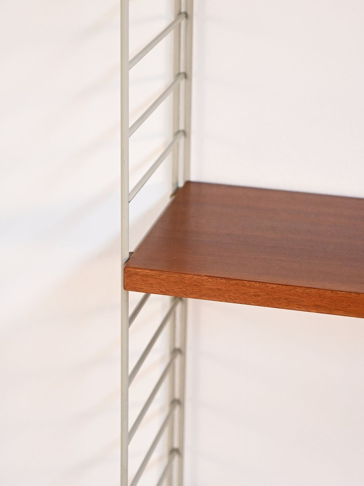 photo furniture “String” Wall Mounted Shelving Unit, Nisse Strinning Bfb Hyllan, 1950s–60s
