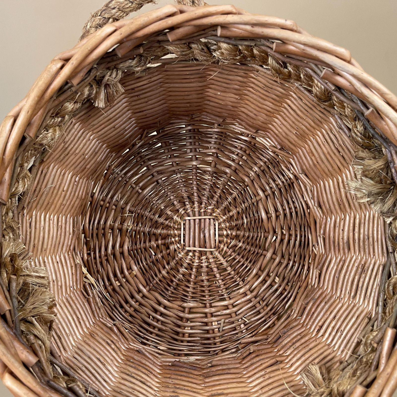 Vintage Round Basket Woven Wicker Brown Antique Cylinder Storage Farmhouse Cottage Decor Laundry Cane Wood Logs Fireplace Rope Handles photo vinterior