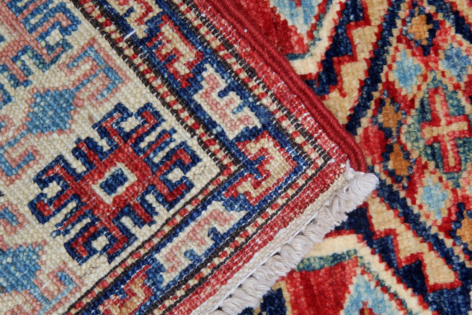 Oosterse tapijten, handgemaakt tapijt, rode geometrische vloerkleden photo Textiel