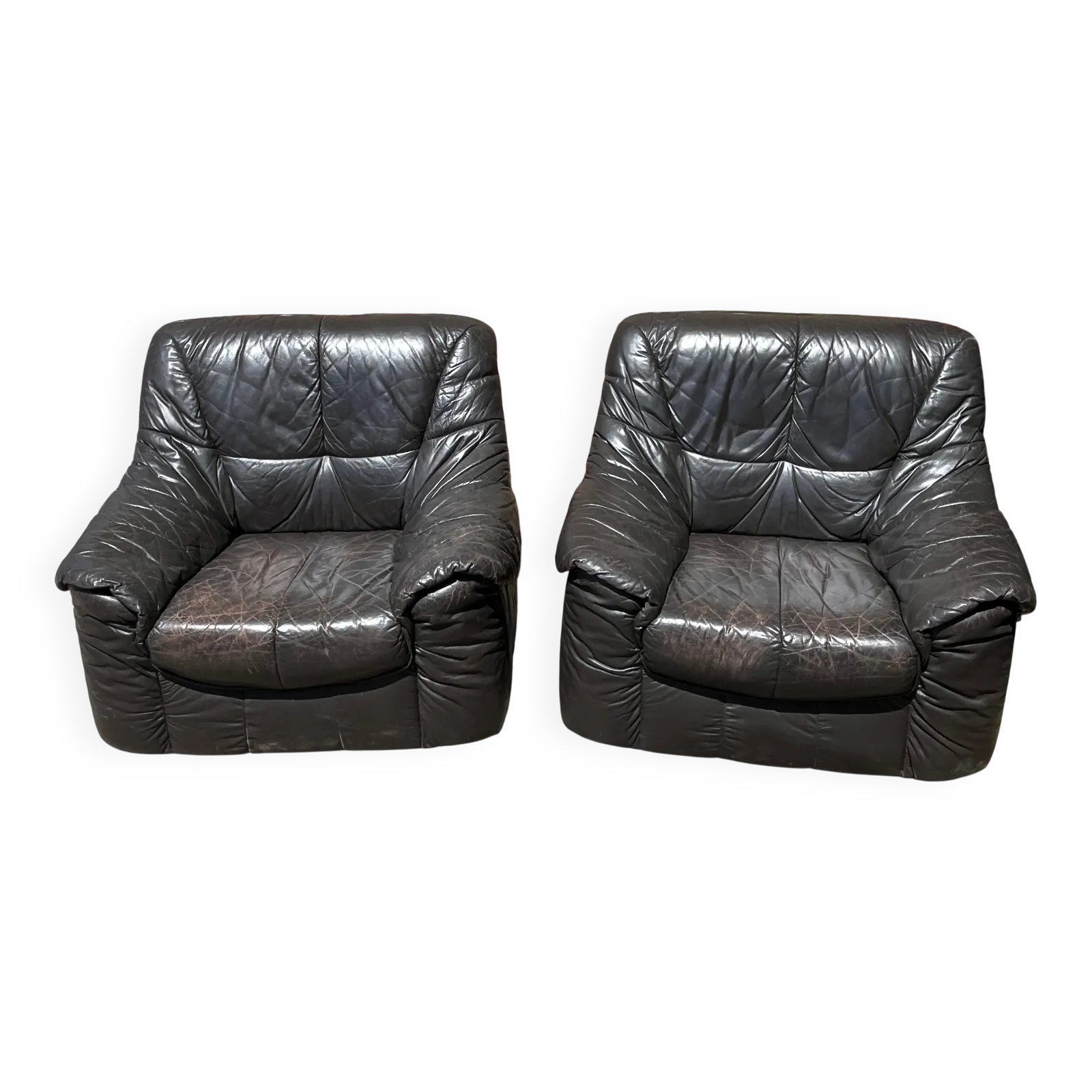 Paar fauteuils van gepatineerd leer