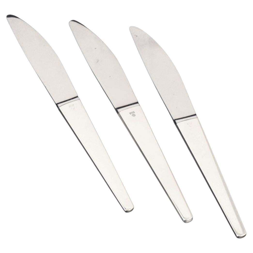 Henning Koppel voor Georg Jensen. Drie 'Caravel' tafeldinermessen.