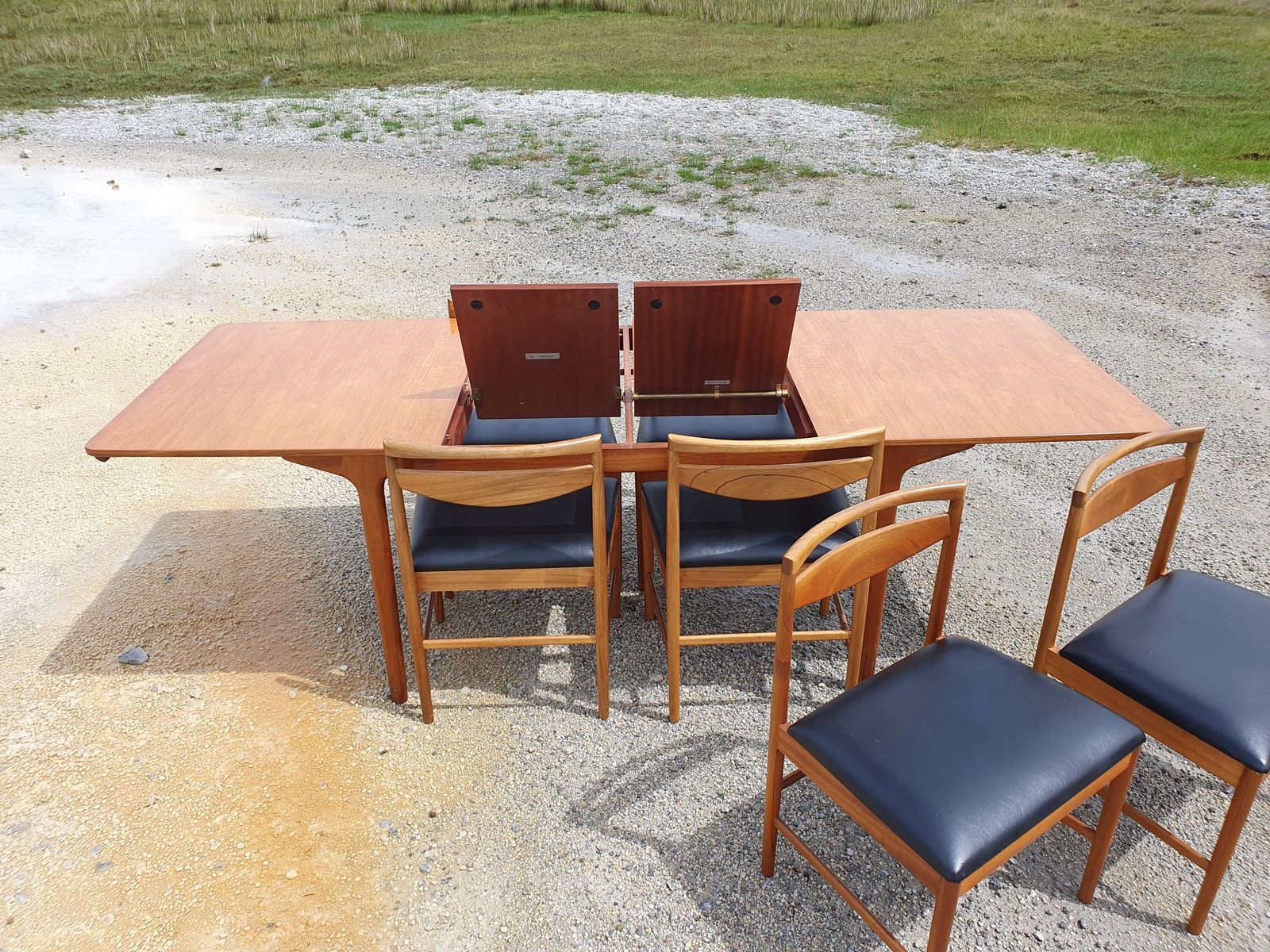 A Mid 20thc Teak, Extending Dining Table And Six Chairs By McIntosh Of Kirkcaldy. photo vinterior