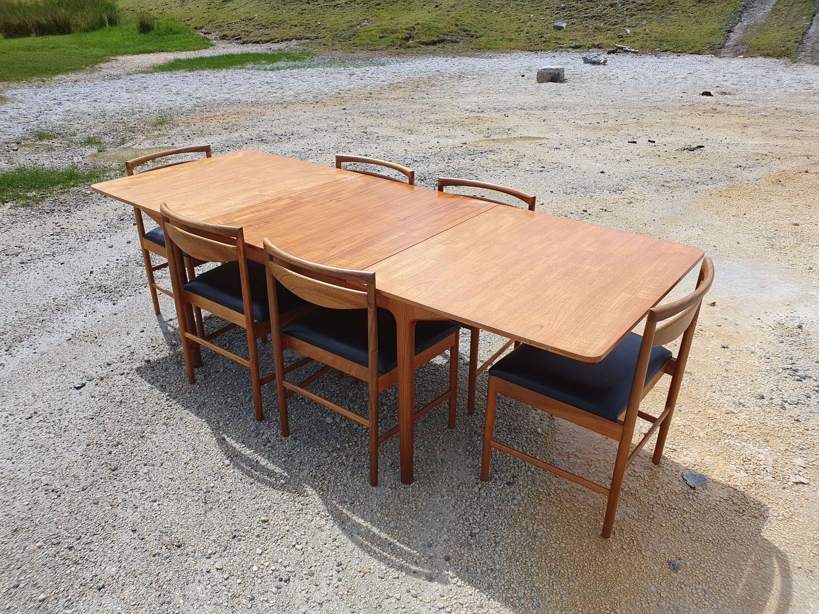 A Mid 20thc Teak, Extending Dining Table And Six Chairs By McIntosh Of Kirkcaldy. photo buy