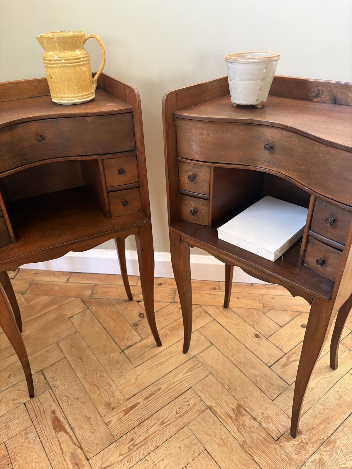 photo furniture A Pair Of French Walnut Bedside Tables