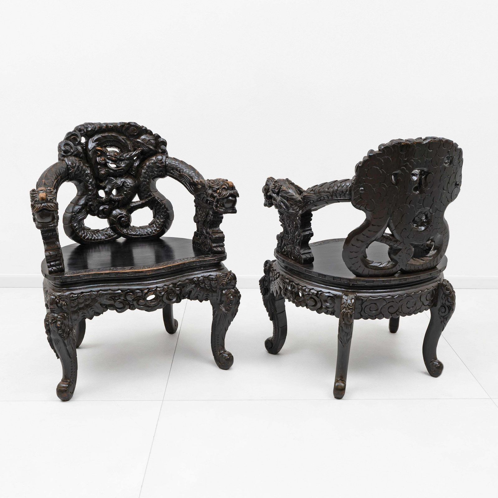 Pair Of Chinese Qing Dynasty Carved Dragon Armchairs, Ebonized Hardwood photo for sale
