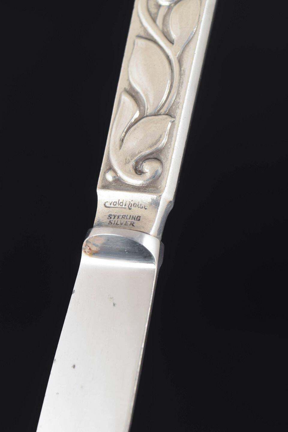 Evald Nielsen. Set van vier fruitmessen in sterling zilver en roestvrij staal. photo Woonaccessoires