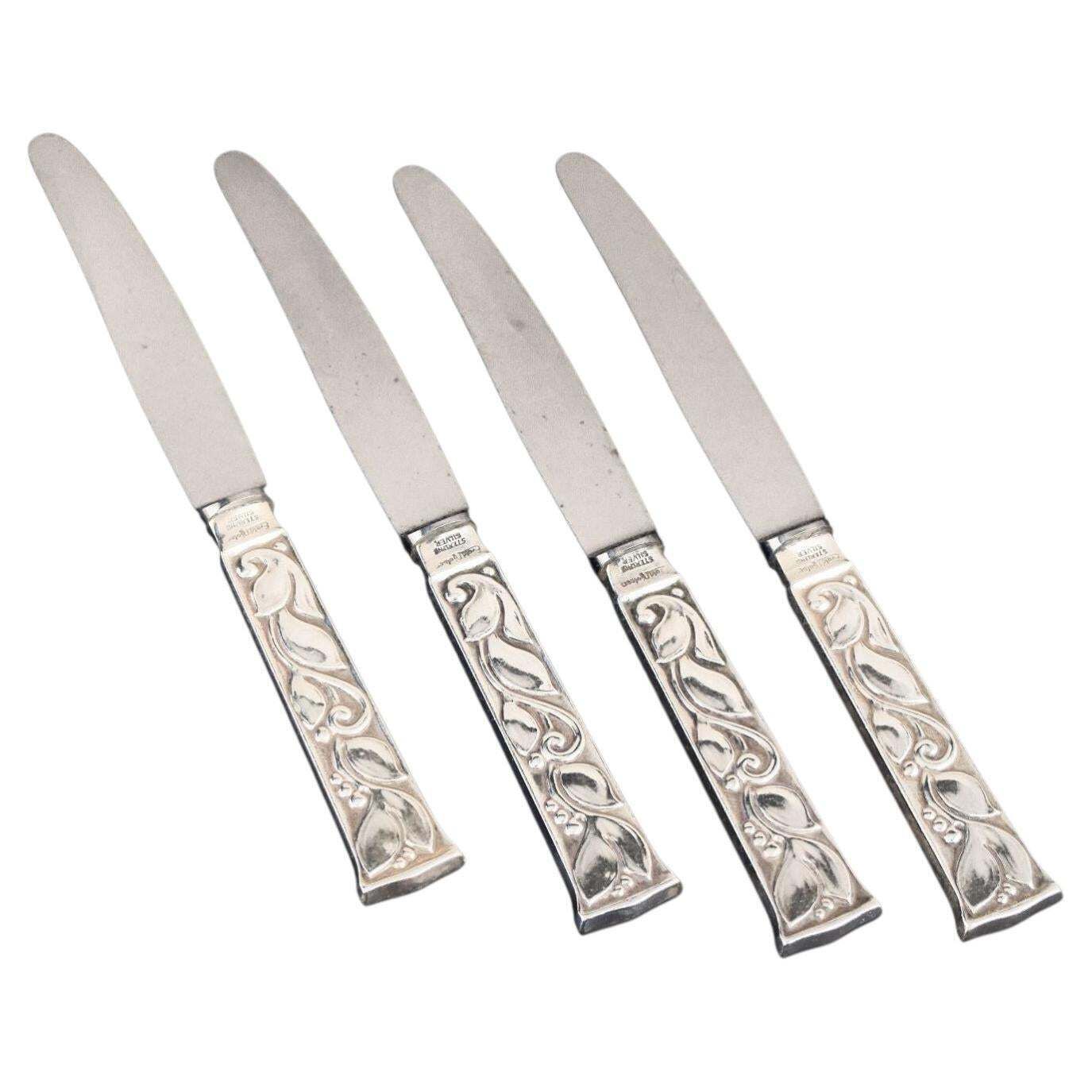 Evald Nielsen. Ensemble de quatre couteaux à fruits en argent sterling et acier inoxydable.