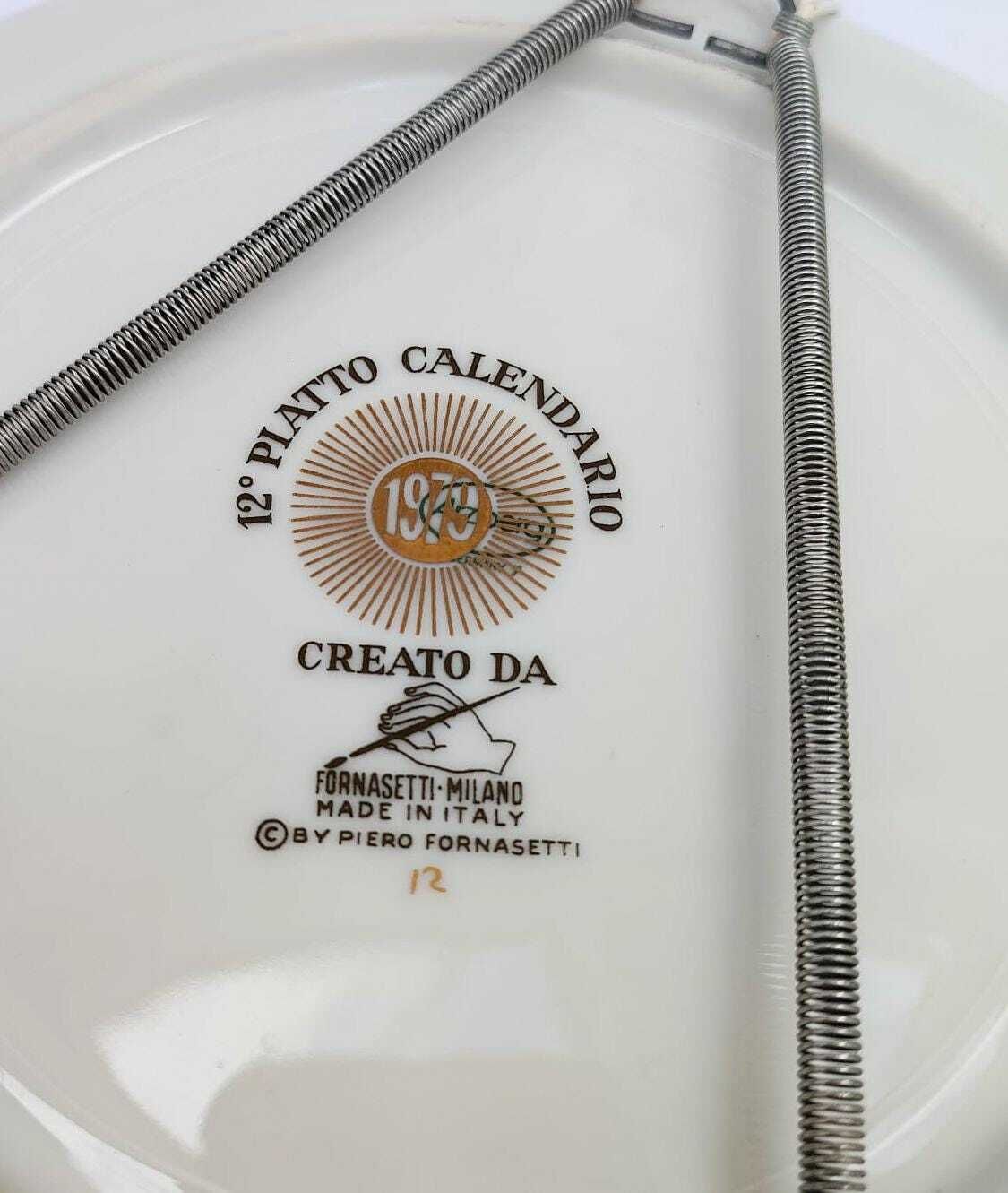 Assiette calendrier en céramique vintage Piero Fornasetti Milano 1979, noire et dorée photo 323.0