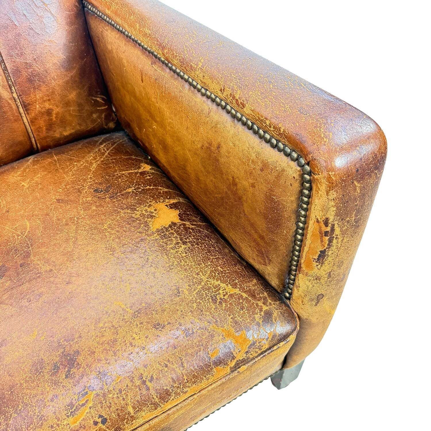 737.0 French Antique Leather Moustache Club Chair photo