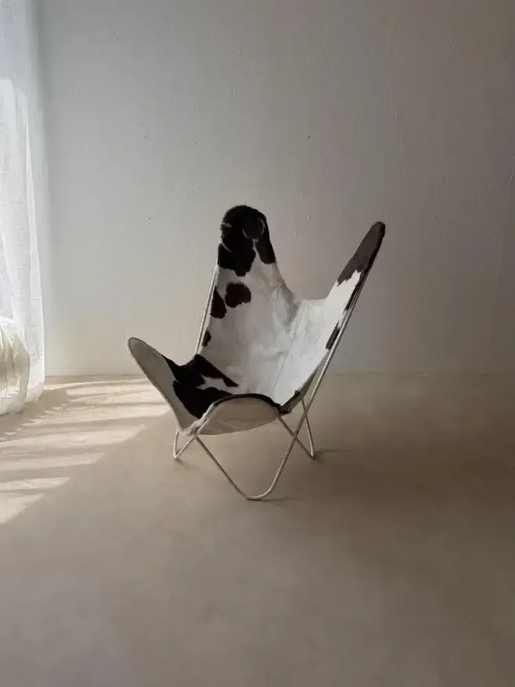 Furniture Vintage 1970s Cowhide Butterfly Armchair photo