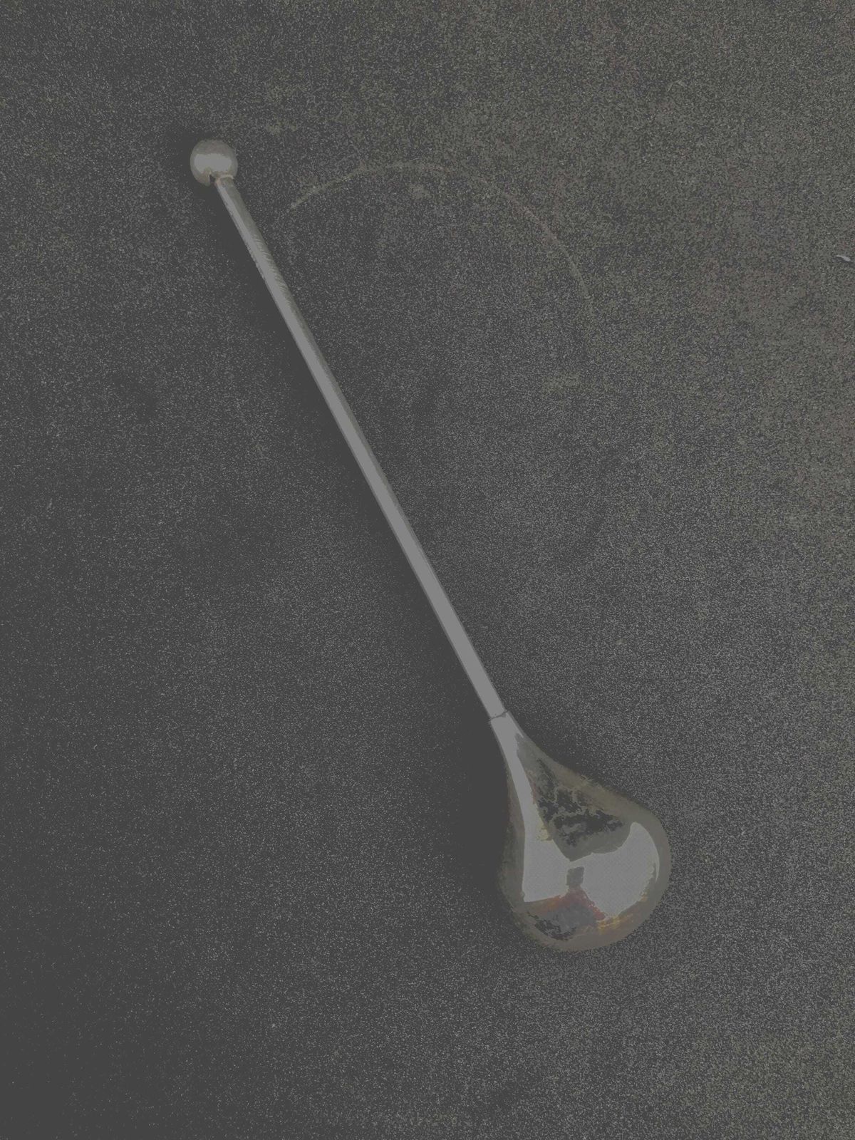 Mid-Century verzilverde cocktailroerder: Deens barware van Piet Hein photo vinterior