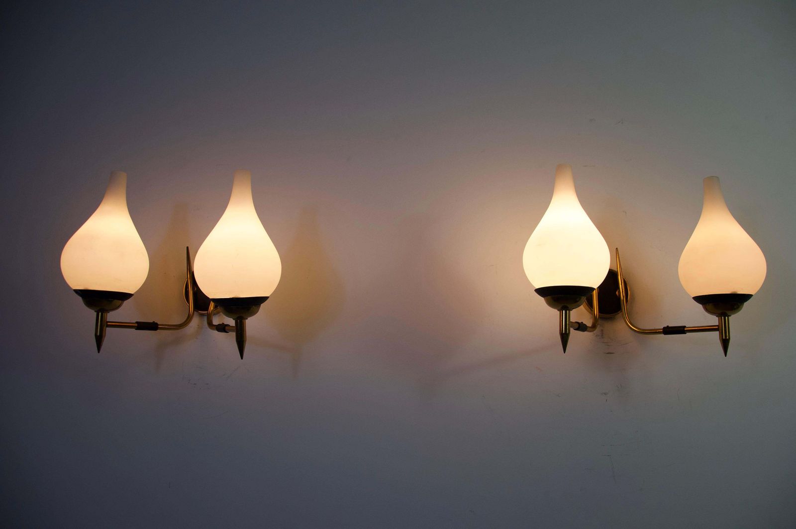 1002.0 Mid Century Brass And Opaline Wall Lamps By Stilnovo, Italy, 1960s photo