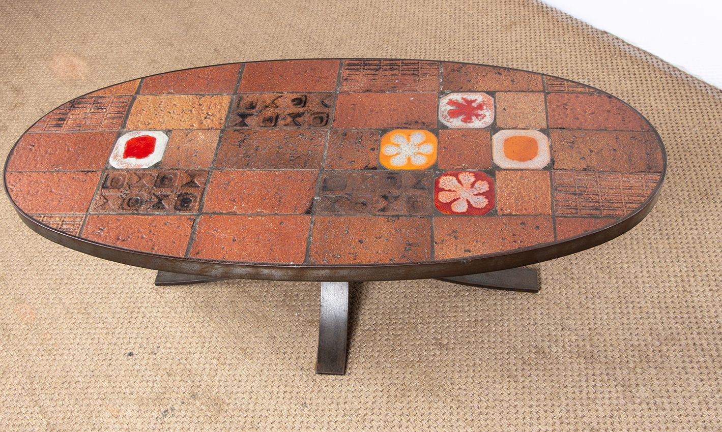photo buy Lava Stone, Ceramic, And Steel Coffee Table By Jean Jaffeux, 1960.