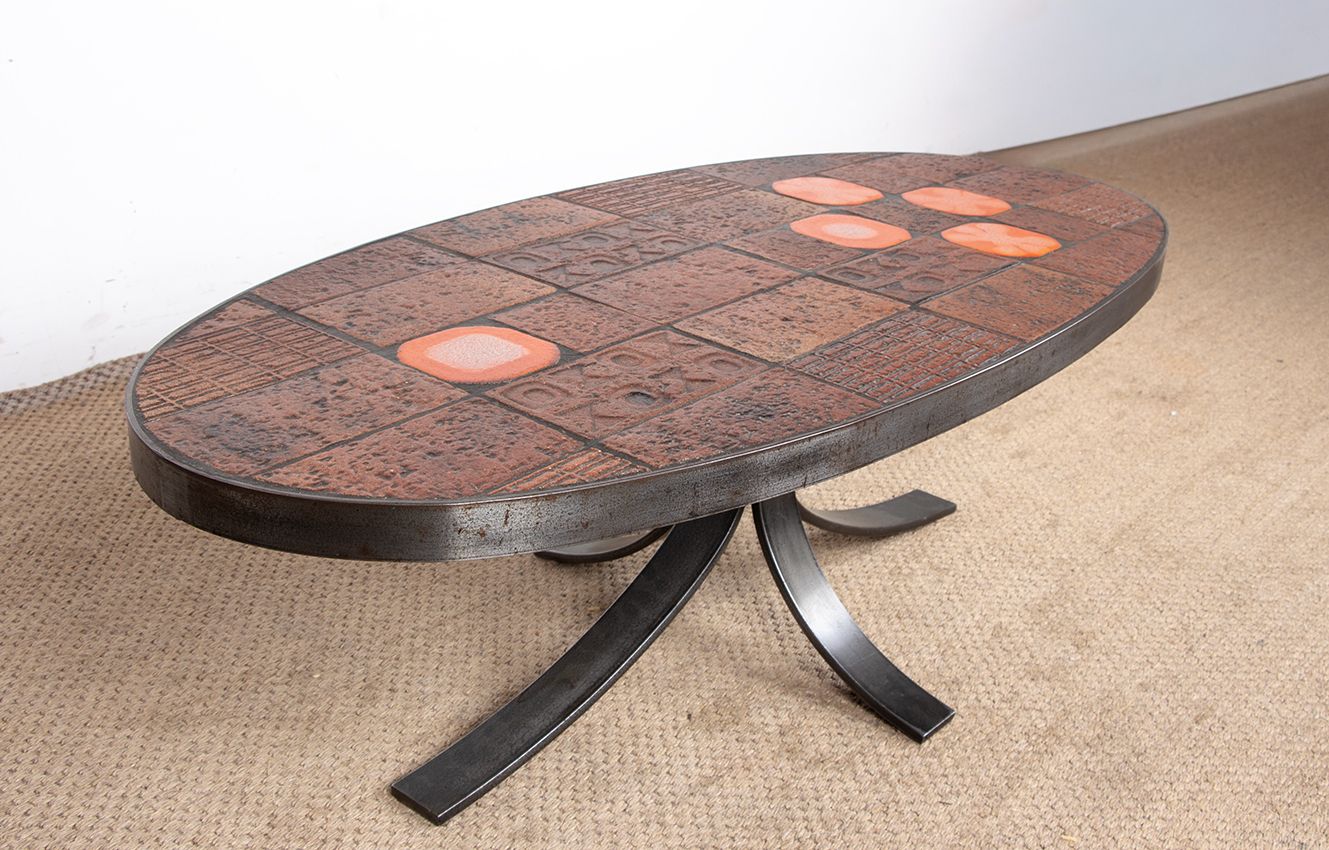 Table basse en pierre de lave, céramique et acier, par Jean Jaffeux, 1960. photo vintage