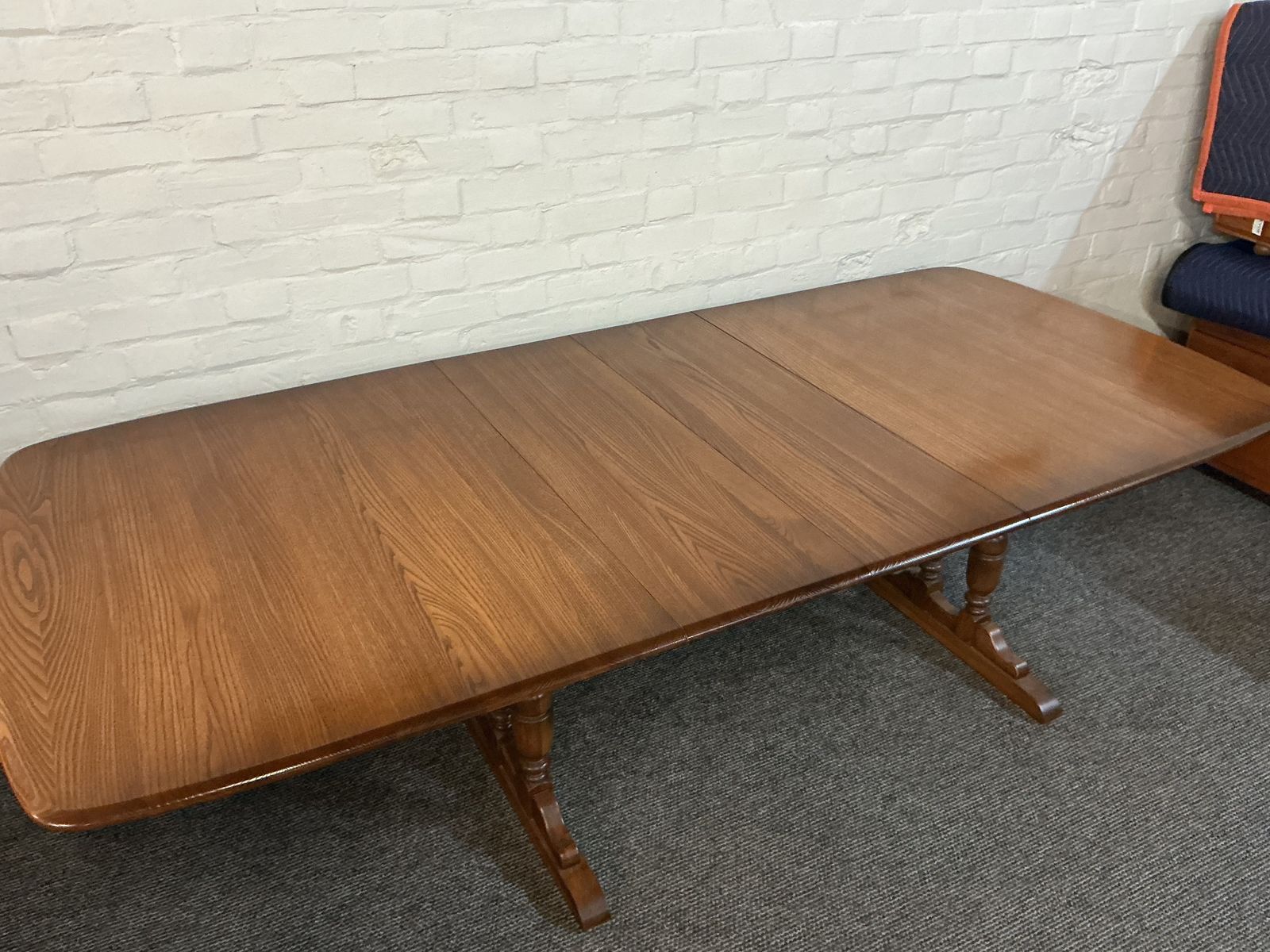 photo furniture Ercol Grand Dorchester Extending Dining Table.