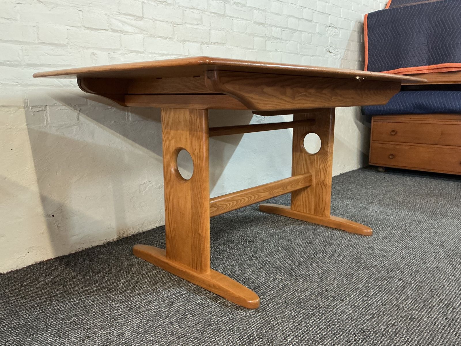 photo vinterior Ercol Windsor Extending Dining Table In Light Finish.