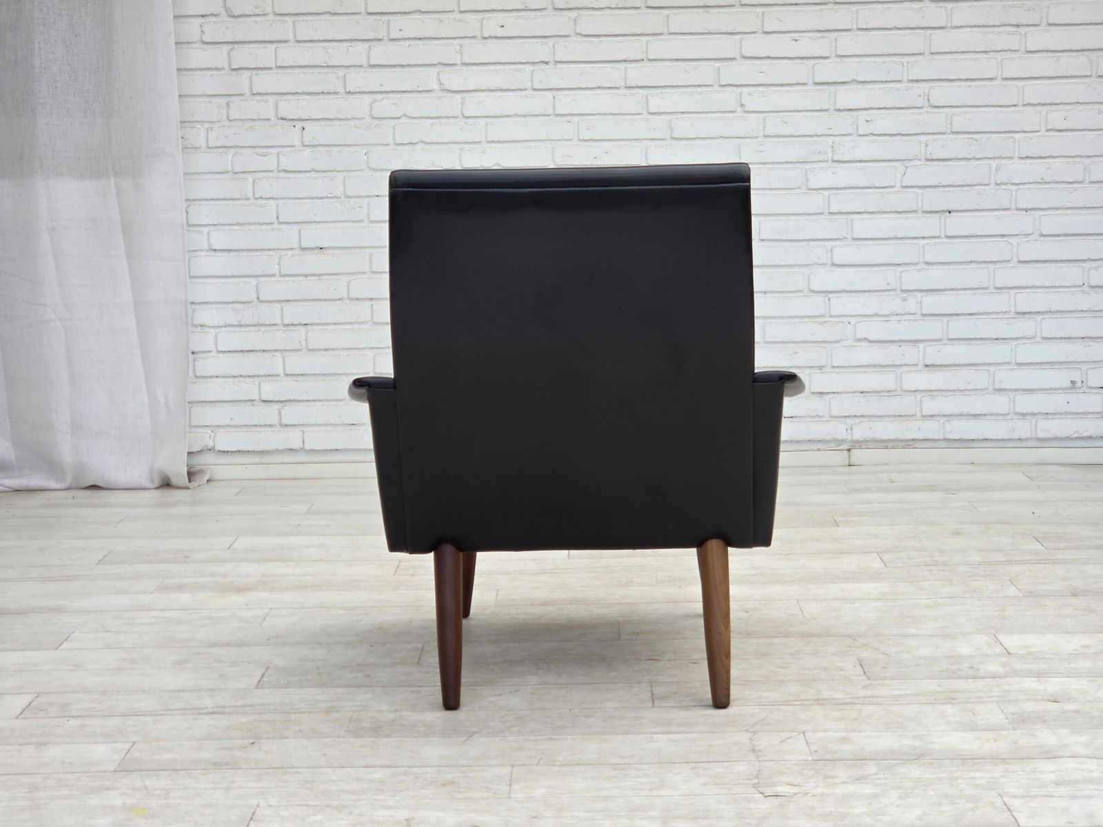 Furniture 1970s, Danish Armchair, Black Artificial Leather, Teak Wood Legs. photo