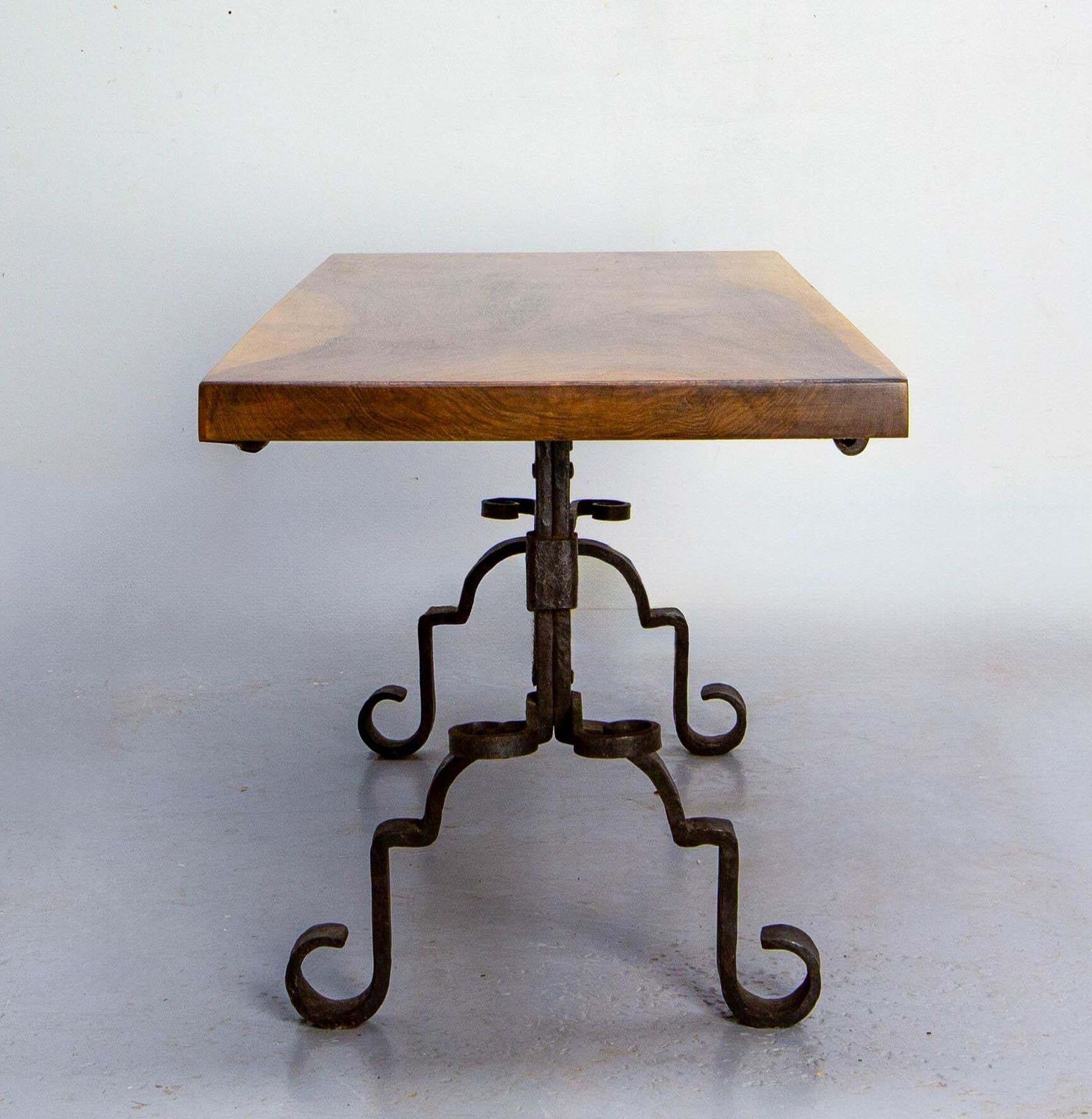 Table basse française en noyer massif et fer forgé, vers 1960 photo for sale