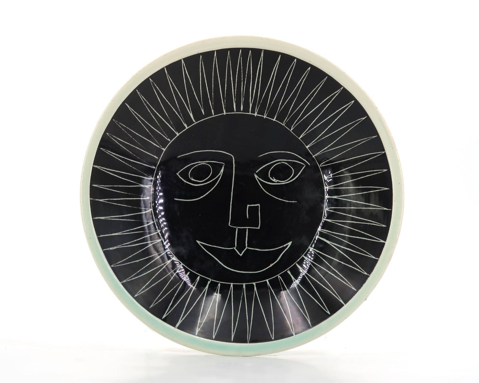 Vide-poche en céramique par Jacques Pouchain, soleil à visage, années 1950.