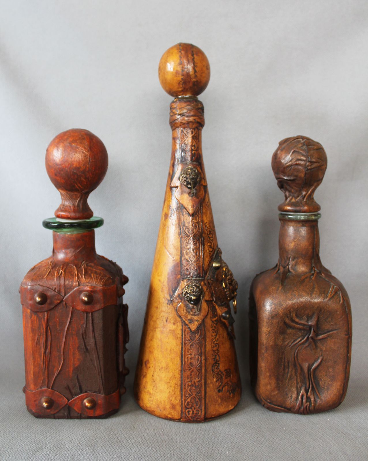photo furniture Set Of 3 Vintage Italian Leather Wrapped Glass Decanters, Italy Wrapped Bottle, Whisky Cognac, Lion Head, Hand Decorated, Hooks, Stopper