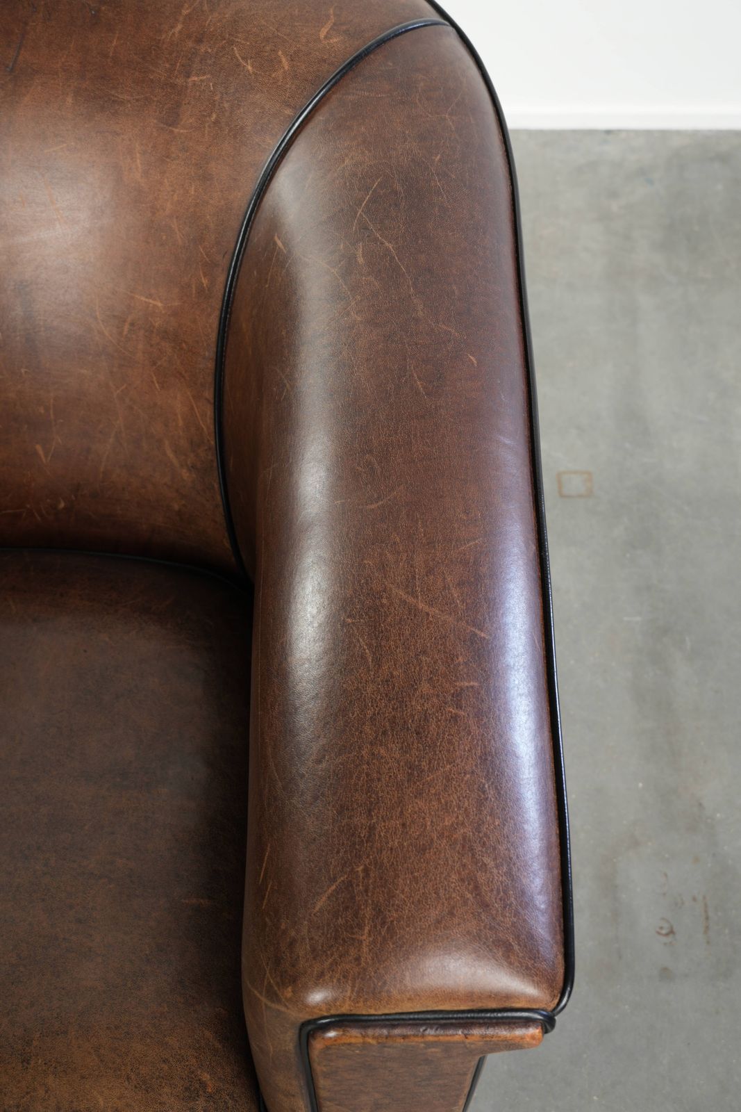 Nice And Sleek Art Deco Designed Sheepskin Club Armchair Finished With Black Piping photo vintage